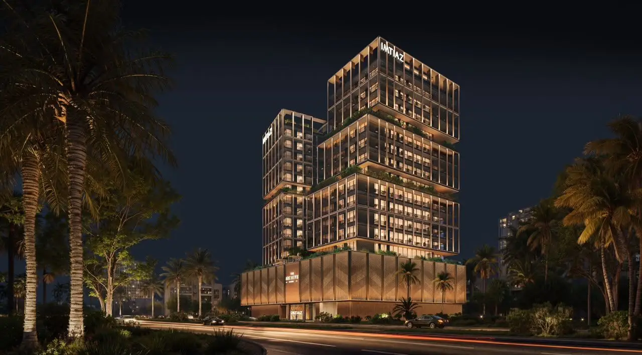 The Archive tower by Imtiaz Developments lit at night